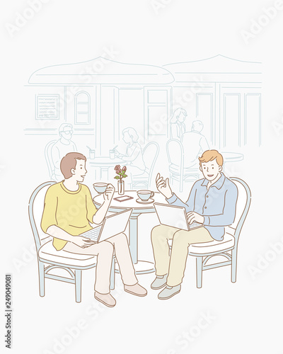 Two freelancers at open air cafe