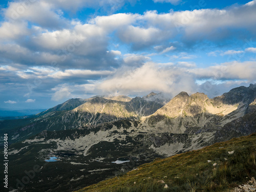 Fototapeta Naklejka Na Ścianę i Meble -  Tatra Mountain part of Carpathian mountain chain in eastern Europe create natural border between Slovakia, Poland. Both protected as national parkland popular destination for winter, summer sports. 