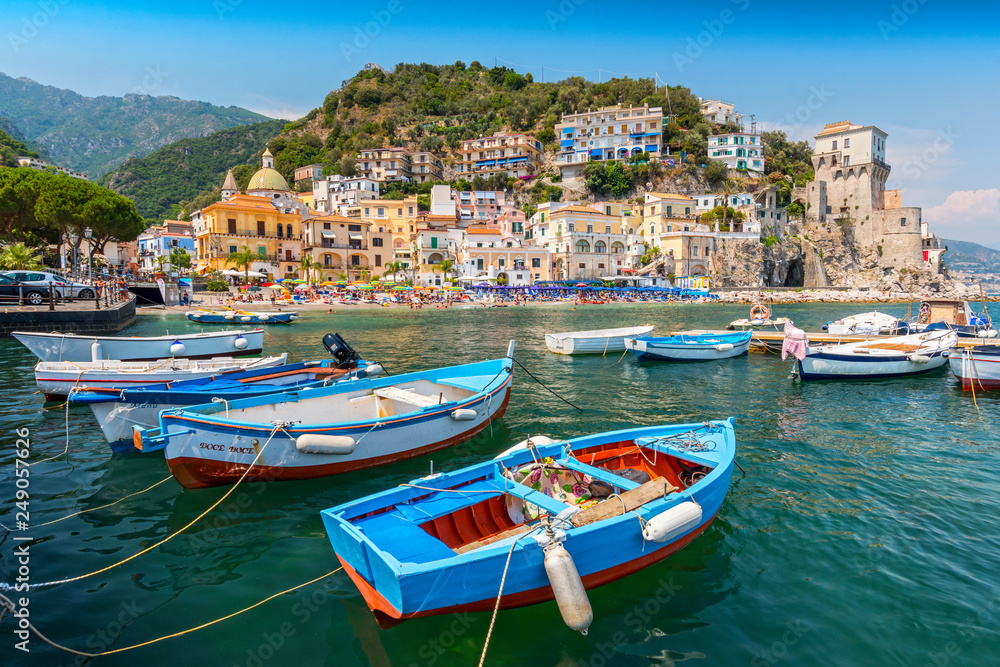 Leisure boats and traditional buildings in Cetara harbor, Amalfi coast, Italy.