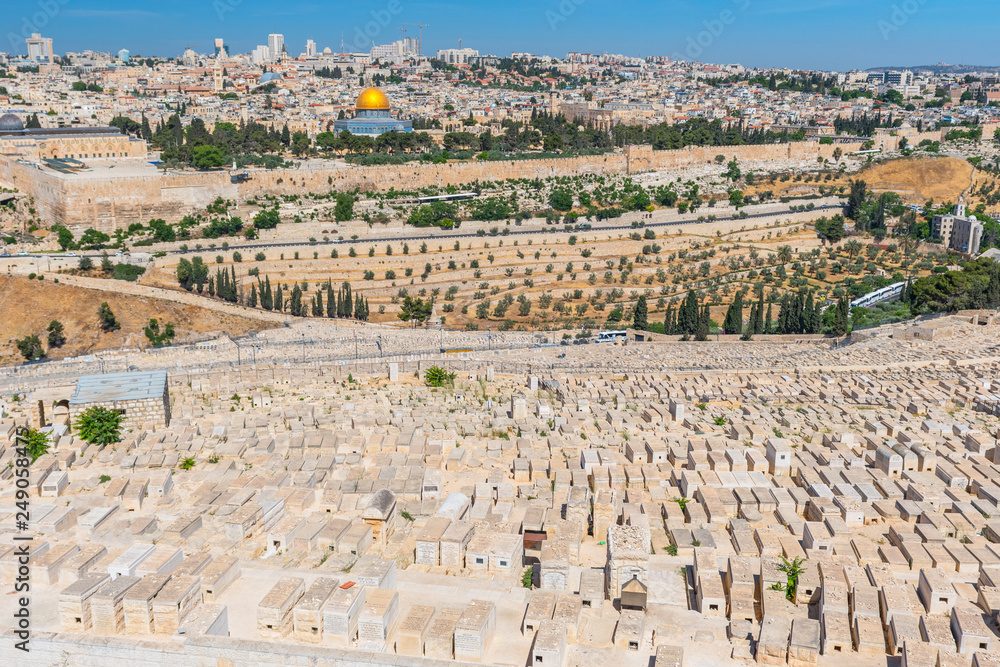Jerusalem old city and the ancient Jewish cemetery in the Olive mountain, Israel.