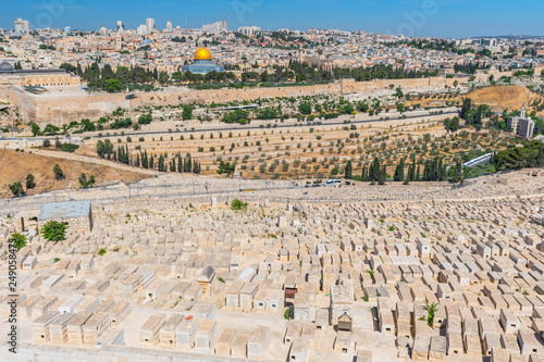Jerusalem old city and the ancient Jewish cemetery in the Olive mountain, Israel.
