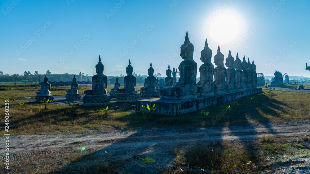 Buddha statues in blue sky at Tungsong Nakornsrithammarat