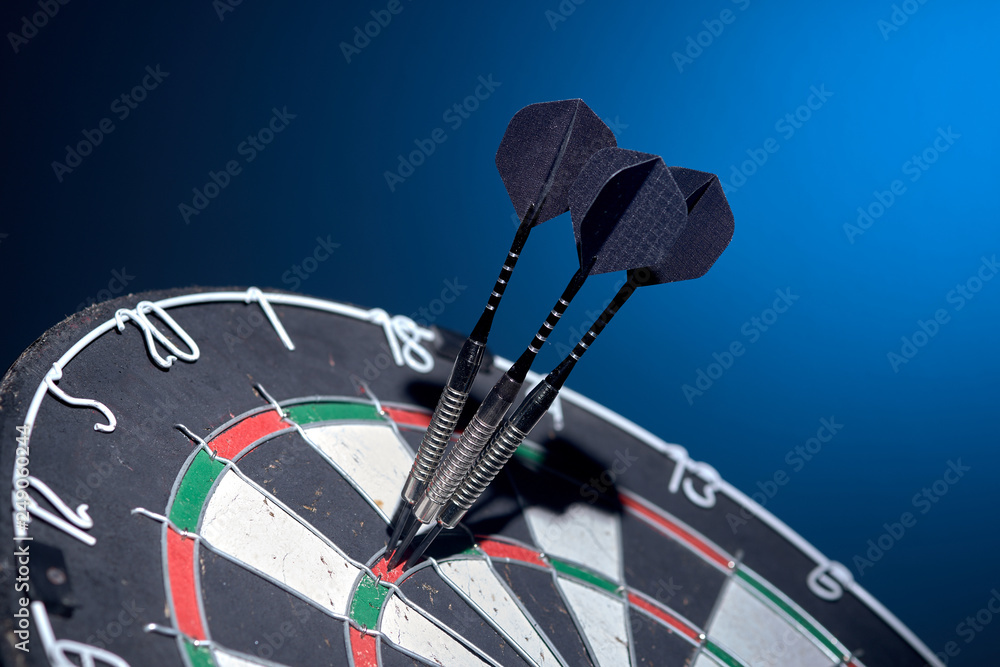 Fotografie Darts. 3 darts in triple 20.