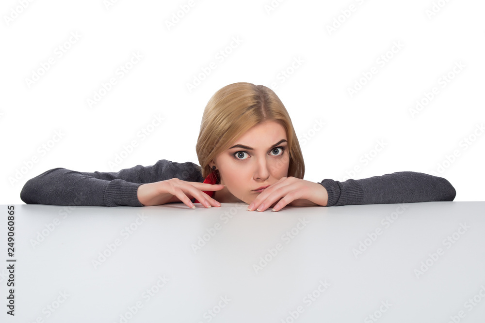 Office, business, technology, finances and internet concept-Business woman looking from under the table Office, business, technology, finances and internet concept-Business woman looking from under the table