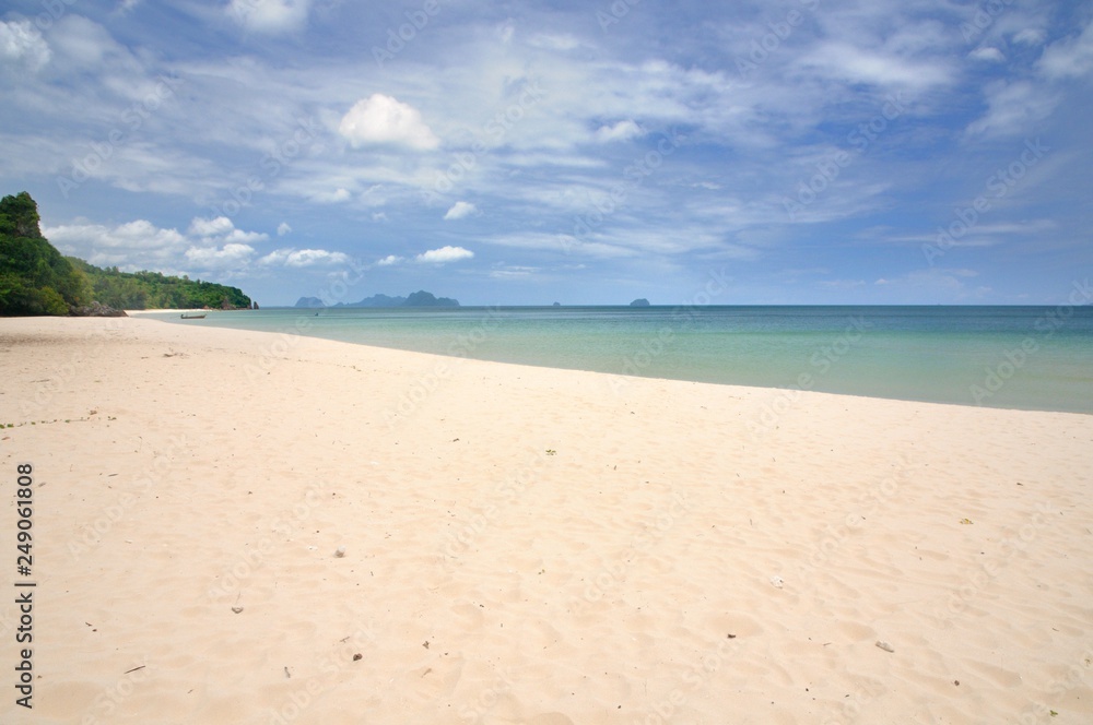 Paradise Thung San beach with white sand and rocky limestone cliff at Pathio District of Chumphon province of Thailand Paradise Thung San beach with white sand and rocky limestone cliff at Pathio District of Chumphon province of Thailand