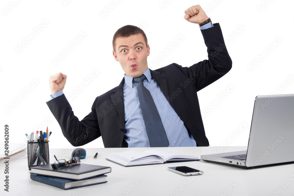 Smiling businessman with laptop computer and documents at office Smiling businessman with laptop computer and documents at office