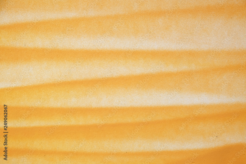 Fototapeta premium Orange paint on the wall