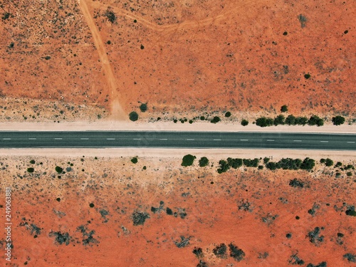 Rare paved road in the australian outback near Ayers Rock / Uluru photo