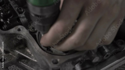 Dismantling automotive modern automatic transmission DSG7, close-up, hydroaccumulator photo