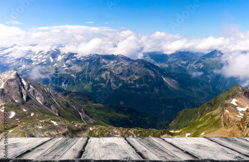 Wooden empty table and mountains landscape background