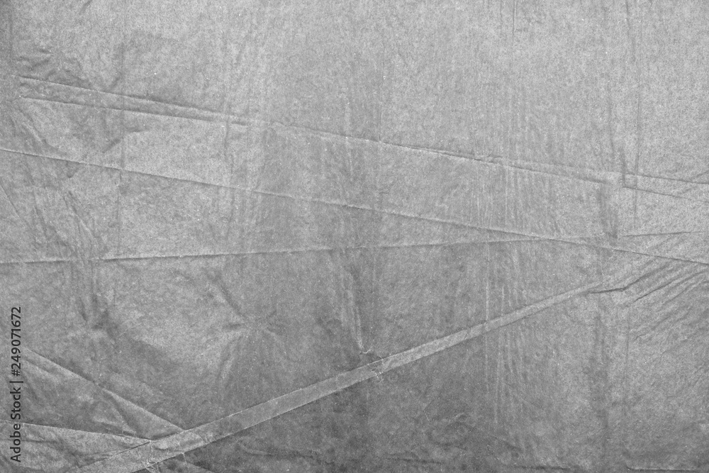 Fototapeta premium Crumpled wax paper sheet texture