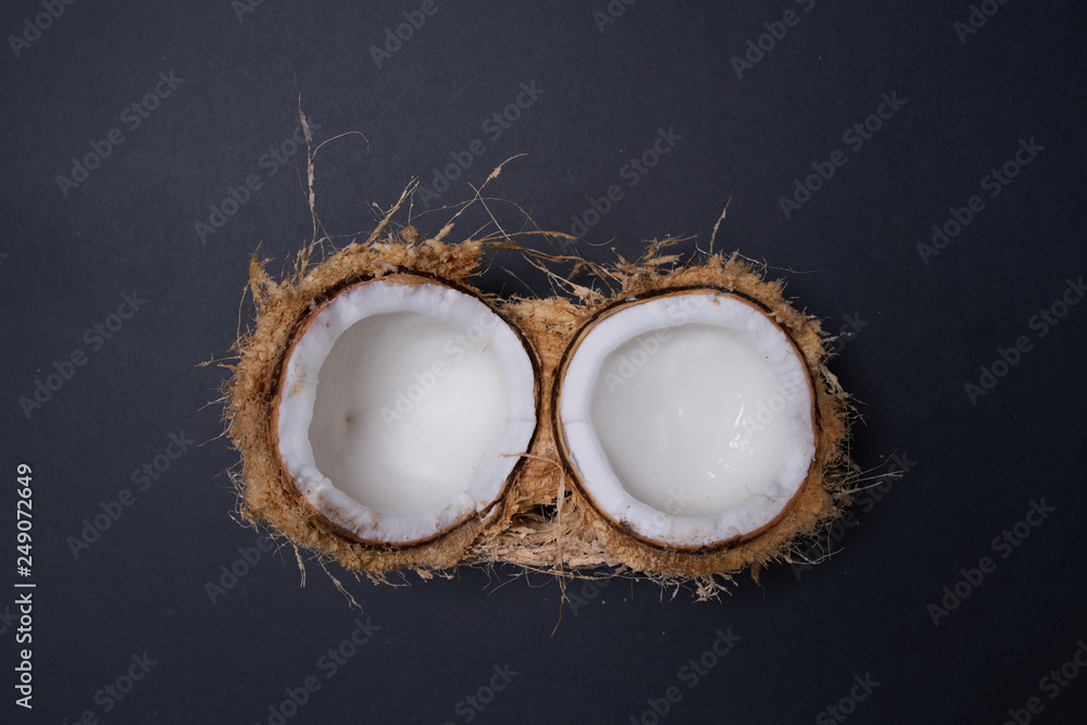 coconut on black table coconut on black table