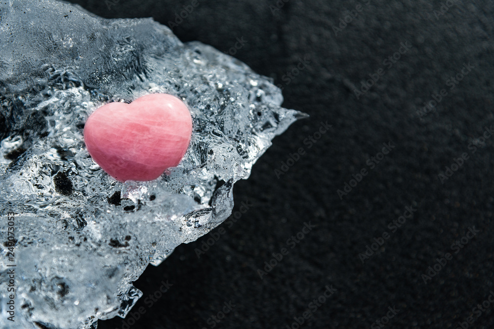 Fototapeta premium Red heart on crystal clear ice