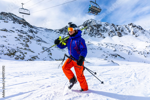 Portrait of a skier in high mountain