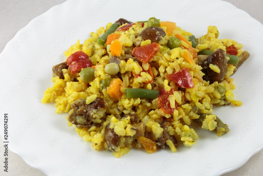 Dish with delicious spinach vegetable risotto. Concept of vegan breakfast. Dish with delicious spinach vegetable risotto. Concept of vegan breakfast.