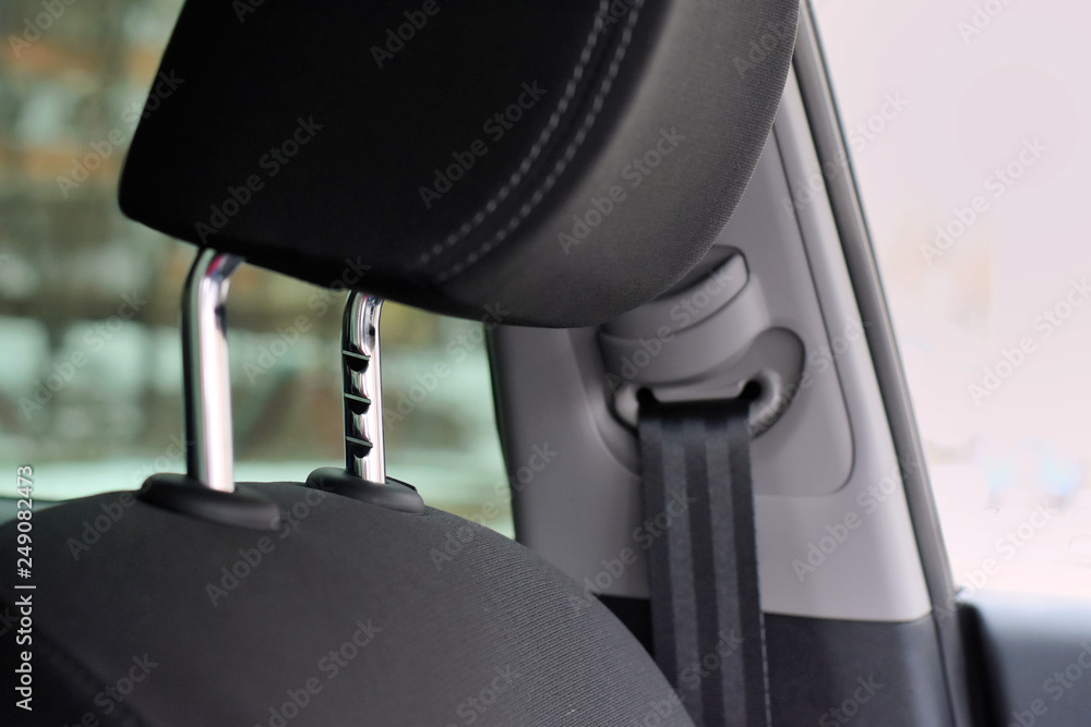 Black car headrest with selective focus and metal protect element