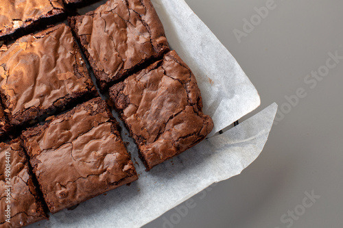 Chocolate brownies on a grey worktop