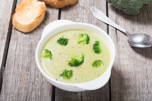 Fresh broccoli cream soup in bowl