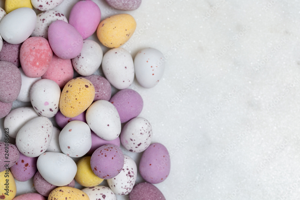 Easter eggs candy coloured with text space to right Easter eggs candy coloured with text space to right