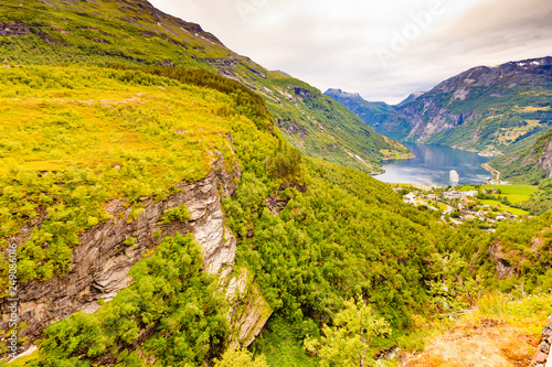 Fjord Geirangerfjord with ferry boat, Norway. photo