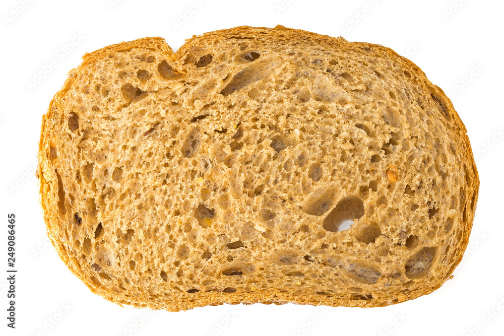 Slices of bread isolated on white background. A slice of bread on a white background. Single slice of wholemeal brown bread shot from above on white background