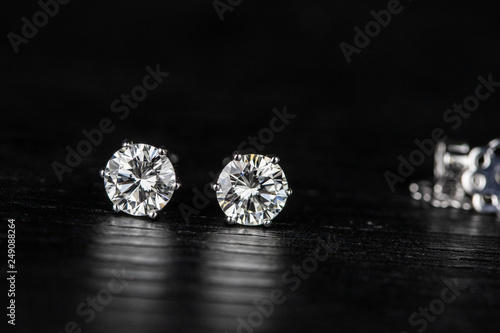 diamond earring on black background