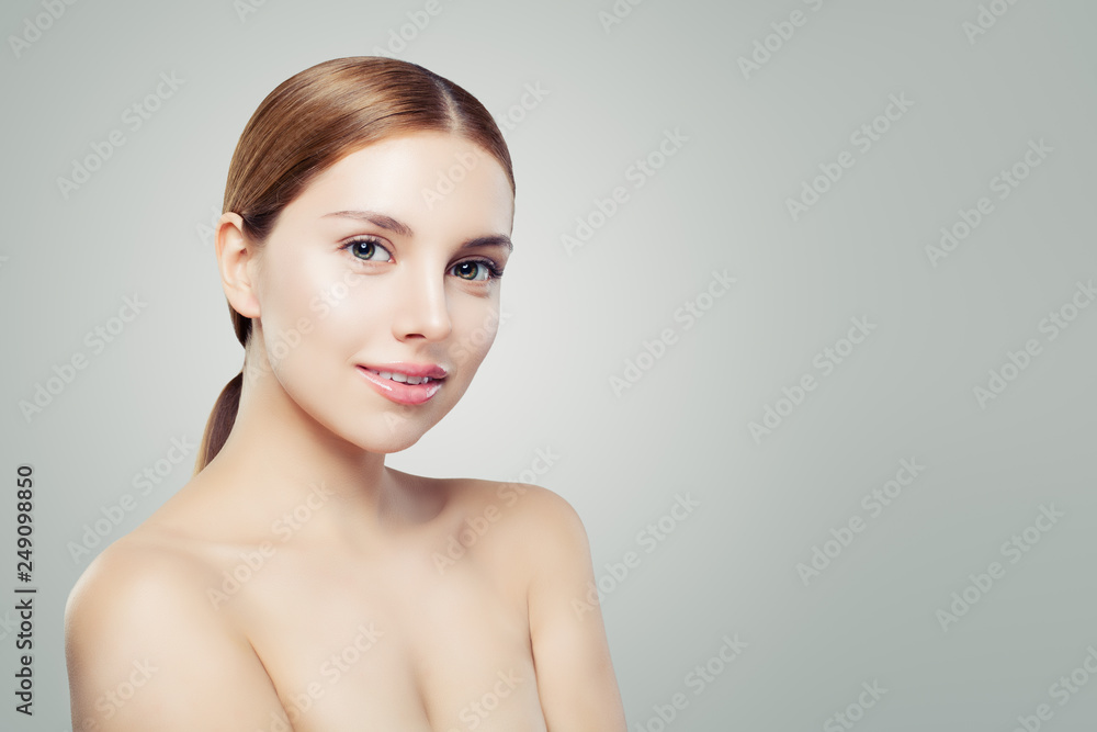 Young perfect woman. Beautiful girl with healthy clear skin. Facial treatment, skincare and cosmetology concept. Young perfect woman. Beautiful girl with healthy clear skin. Facial treatment, skincare and cosmetology concept.
