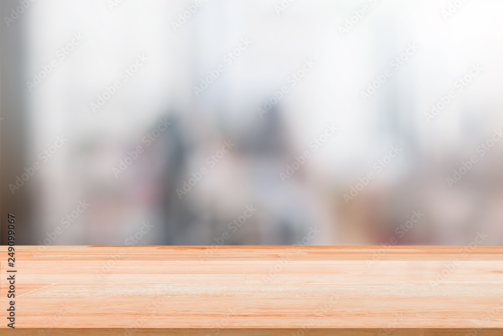 Blank Wood Table Top on blurred people background with bokeh or coffee cafe background for montage product present Blank Wood Table Top on blurred people background with bokeh or coffee cafe background for montage product present