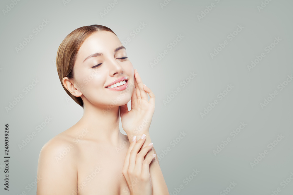 Beautiful girl relaxing. Woman face with healthy clear skin, eyes closed.  Skincare and cosmetology concept. Stock Photo | Adobe Stock