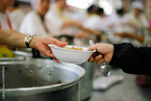 Fotografie Feeding the poor Help them relieve hunger.