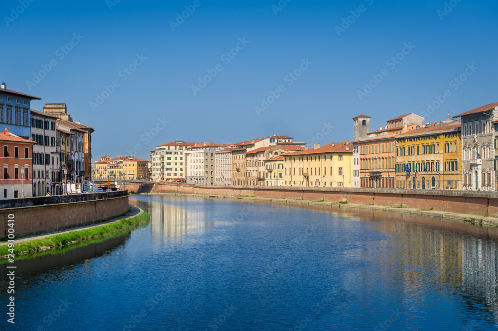Old buildings of Pisa at Arno river shores. Toscana province, Italy