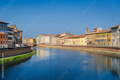 Old buildings of Pisa at Arno river shores. Toscana province, Italy