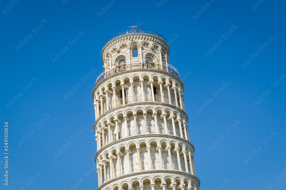 Pisa Tower upper section close view. Toscana famous attraction, Italy.