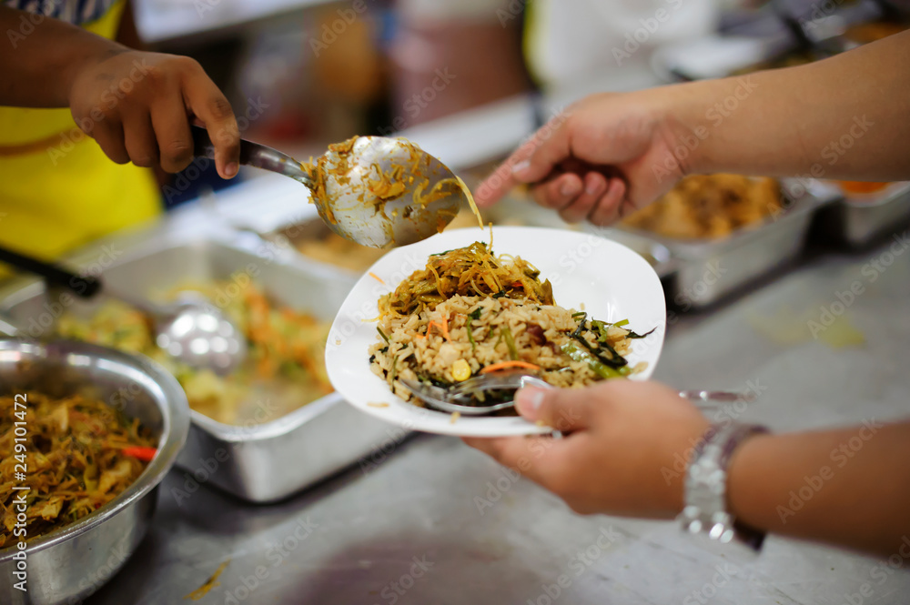 Warm food for the poor and homeless : concept giving with charity