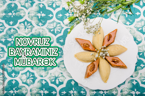 Novruz holiday poster with wording in translation Happy Novruz Celebration photo