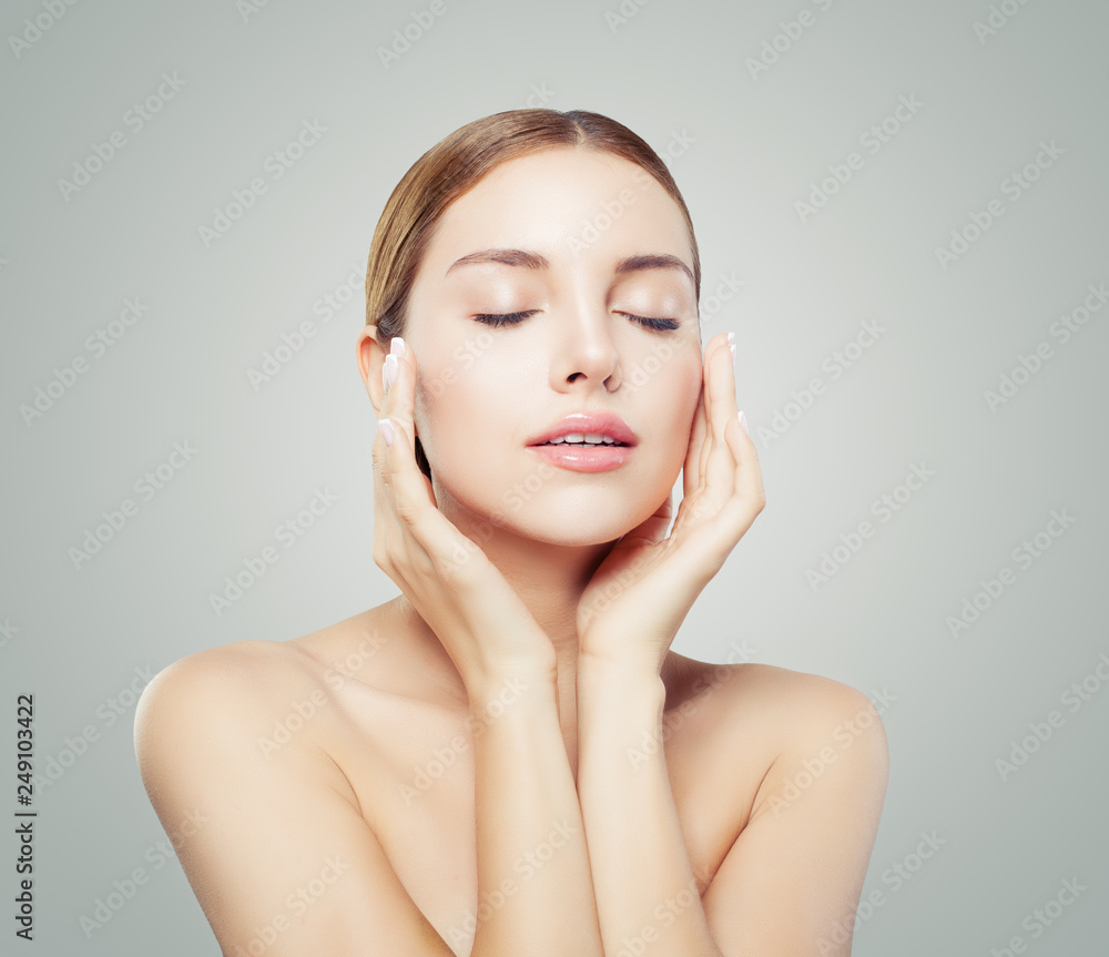 © artmim - Pretty woman with closed eyes  and young healthy skin. Facial treatment, face lifting, anti aging and skin care concept.