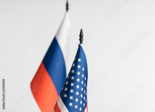 The flags of the USA and Russia on a white background isolated. The concept of policy