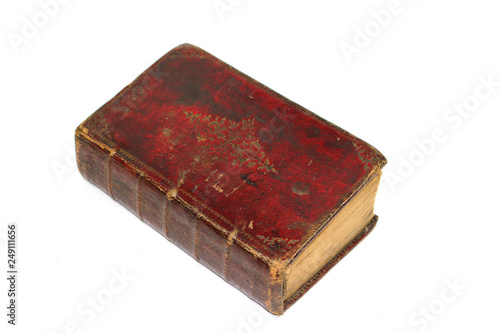 Canvas Print Antique Leather Bound Red book on White Background