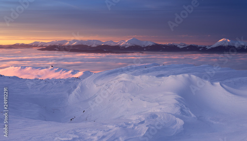 View to winter Chornohora mountain range in twilight
