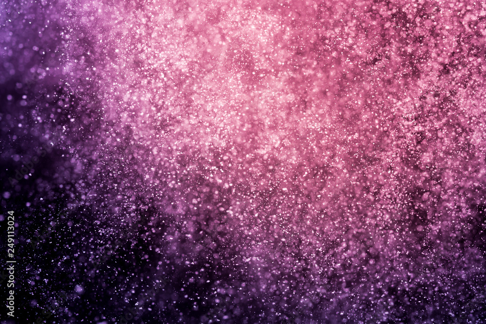 Abstract purple bokeh defocus glitter background.