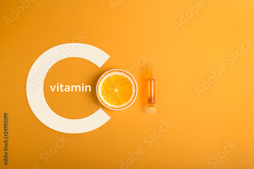 Serum and cosmetics with vitamin C.  Immunity protection concept, antiviral prevention Essential oil from citrus fruits.  photo