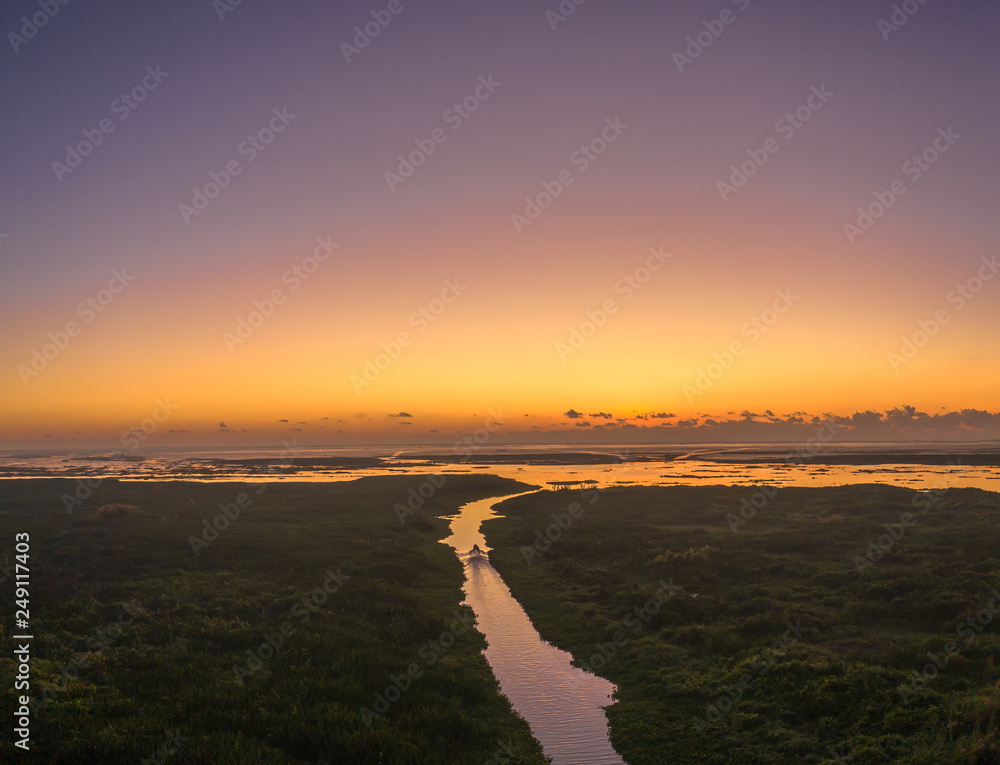 aerial view above Thale Noi bird watching tower in Phatthalung. Thale Noi is the second of largest lake in Thailand. the lake is an abundant food a source for waterfowl habitat a source of sea food. aerial view above Thale Noi bird watching tower in Phatthalung. Thale Noi is the second of largest lake in Thailand. the lake is an abundant food a source for waterfowl habitat a source of sea food.