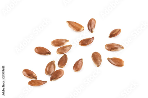 Some linseeds or flax seeds seen from above and isolated on white background