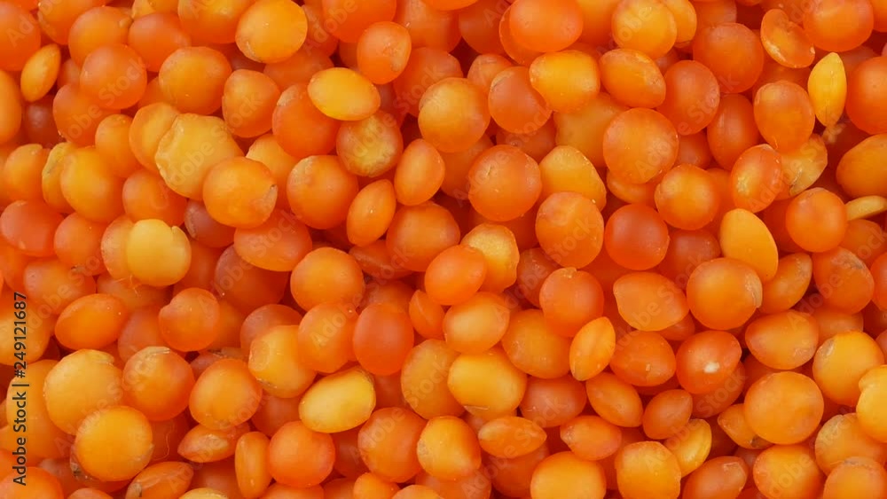 Red lentils background close up Red lentils background close up