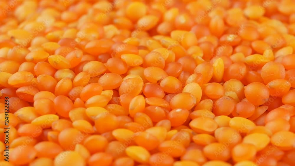 Red lentils background close up