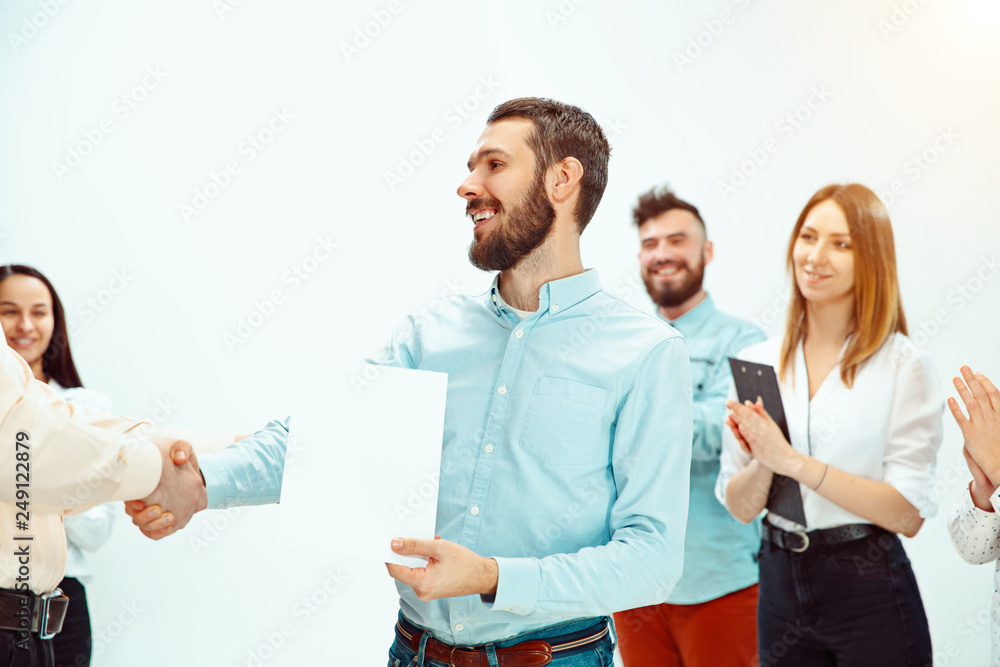 Boss approving and congratulating young successful employee of the company for his successes and good work. National Employee Appreciation Day, businesswoman, businessman, business, success, admire Boss approving and congratulating young successful employee of the company for his successes and good work. National Employee Appreciation Day, businesswoman, businessman, business, success, admire