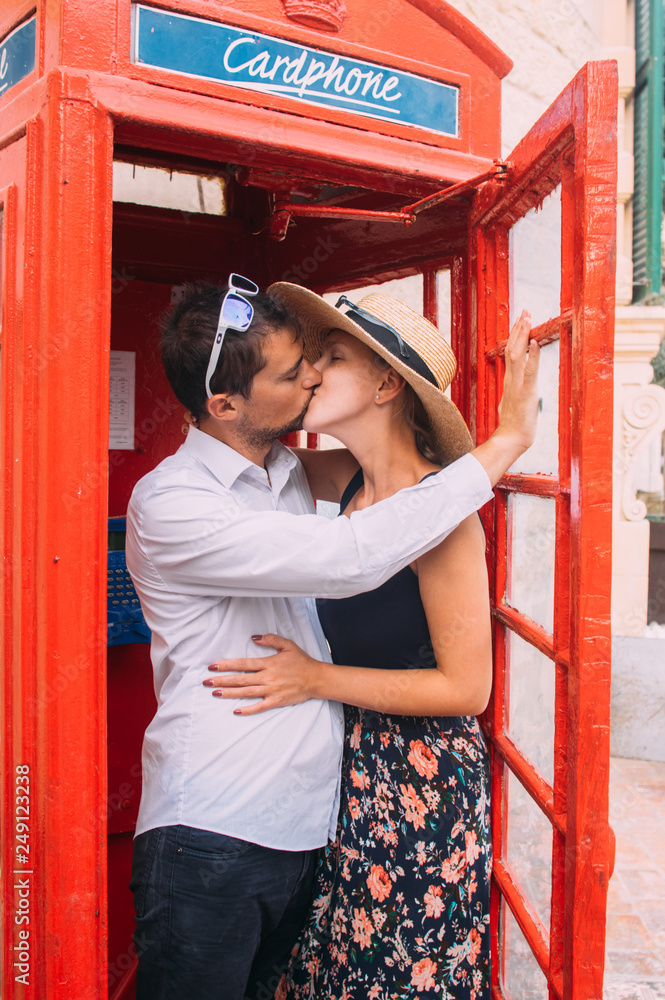Couple kissing in red cabin, Gozo Couple kissing in red cabin, Gozo