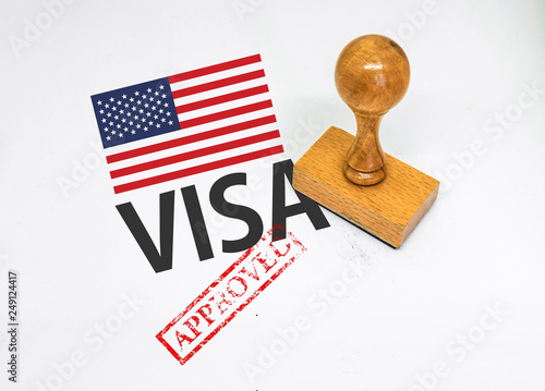 United States Visa Approved with Rubber Stamp and flag photo