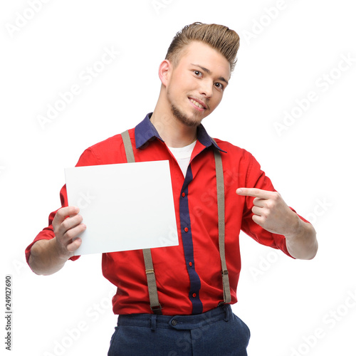 Young man dressed in rock'n'roll or rockabilly style.