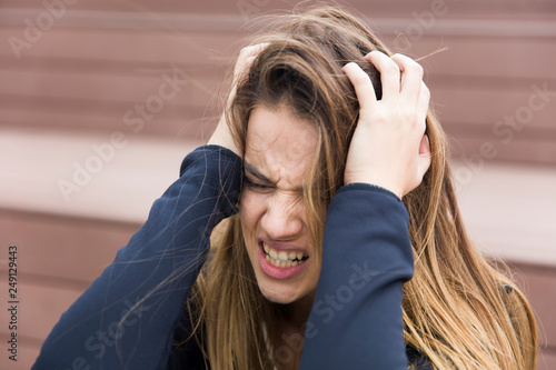 Angry young woman at outdoor
